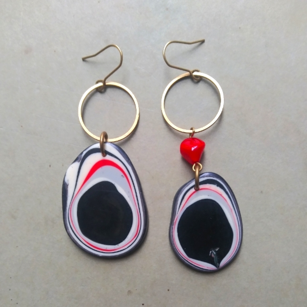 'Modern Industrial Asymmetry' Dangles